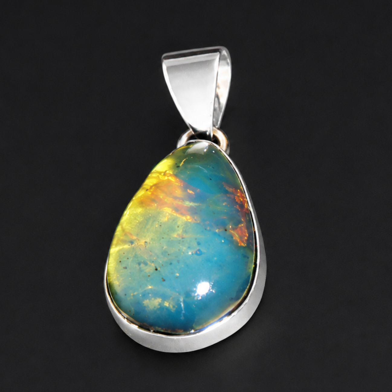 Clear deep blue Natural Dominican Amber teardrop 925 Sterling Pendant 30 mm