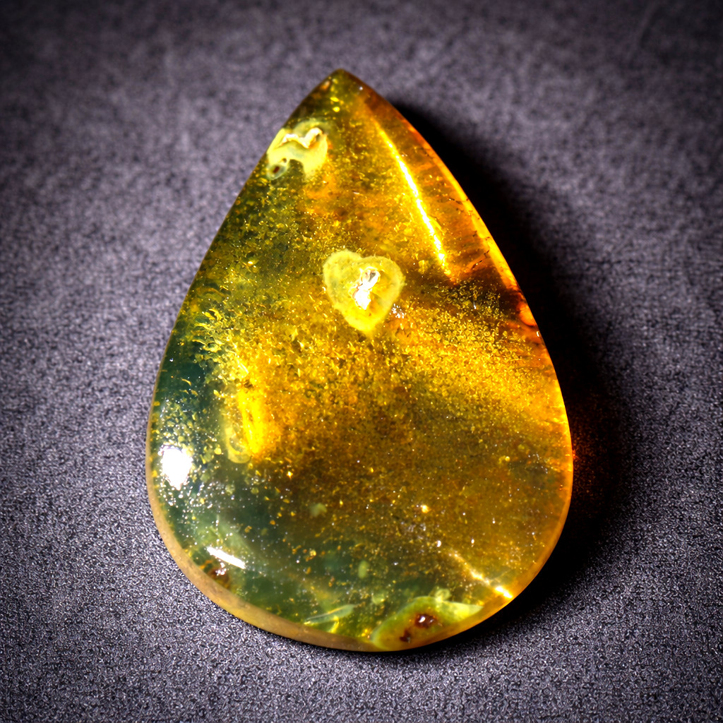 Natural Dominican Blue Amber Polished Stone 26mm Clear Cognac